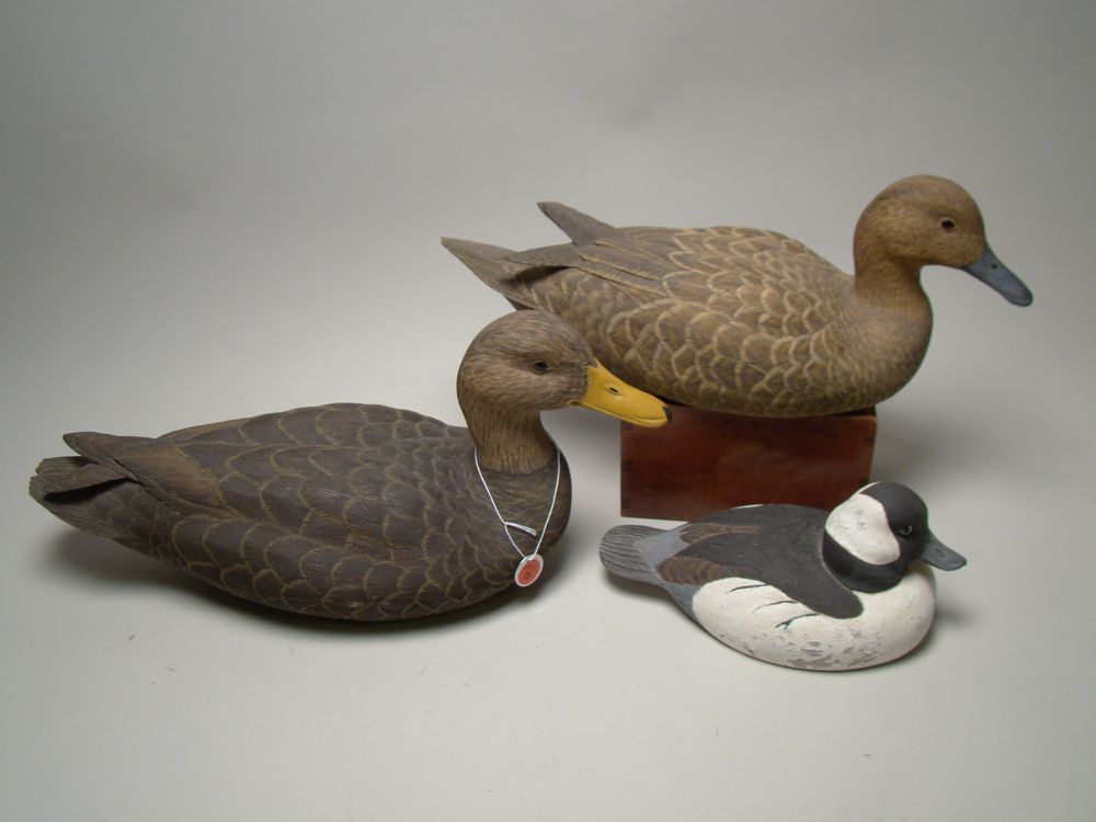 Appraisal: THREE DUCK DECOYS Bufflehead drake pintail hen and a black