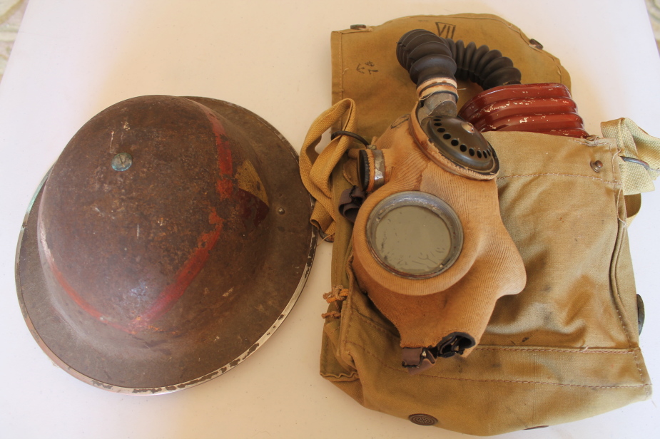 Appraisal: A WWII tin hat and a gas mask