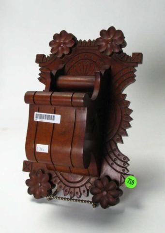 Appraisal: Walnut Victorian wall pocket with surface carvings carved flowers and