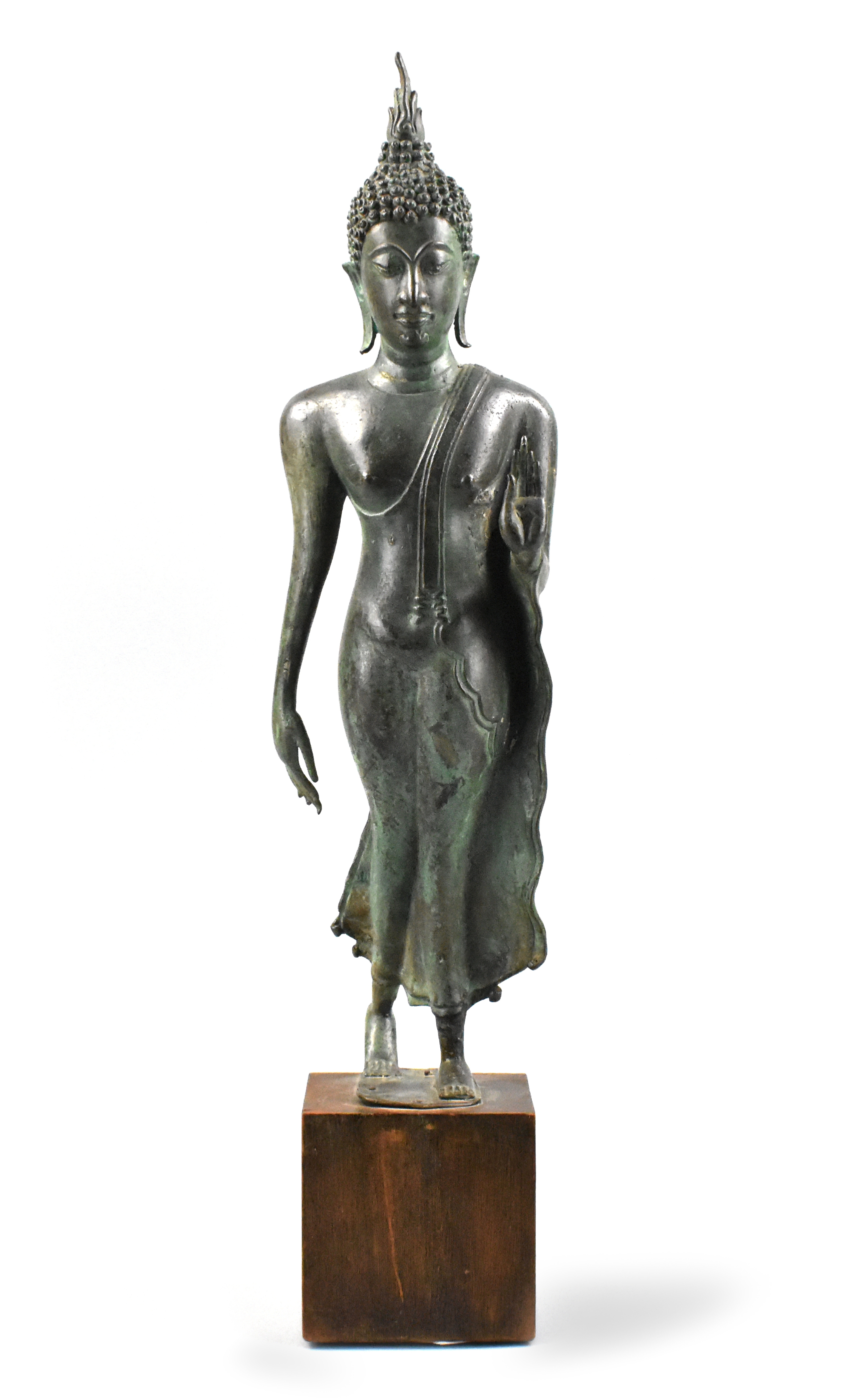 Appraisal: A tall slender bronze buddha figure from Thailand on wooden