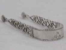 Appraisal: A pair of early Birmingham silver cast pierced tongs with