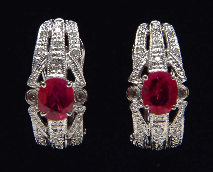 Appraisal: RUBY DIAMOND EARRINGS Elegant kt white gold earrings are each