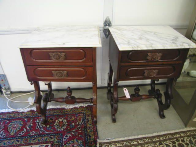 Appraisal: Pair of Mahogany Marble Top Stands double drawer carved roses