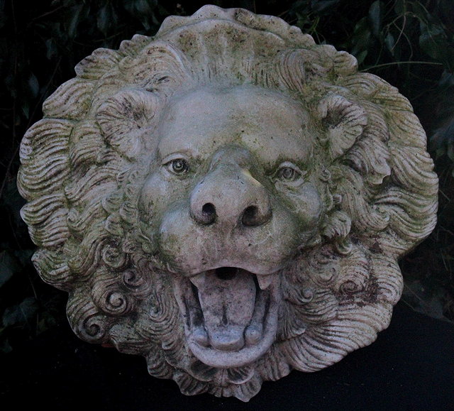 Appraisal: A CAST COMPOSITE STONE LION FOUNTAIN MASK FOUNTAIN with copper