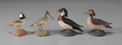 Appraisal: Four Miniature Decoys American th century wood duck drake and