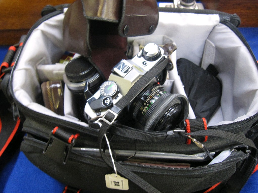 Appraisal: Canon AE camera in bag with accessories