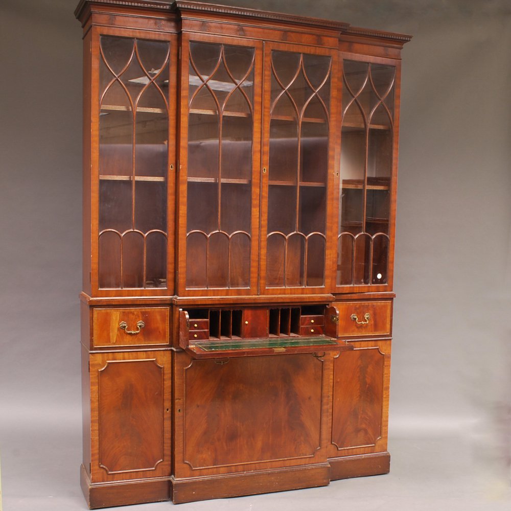 Appraisal: George III-style Mahogany Breakfront Bookcase Secretaire th century the dentil-molded