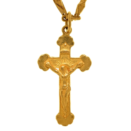 Appraisal: A Malaysian gold crucifix mm h marked and a Malaysian