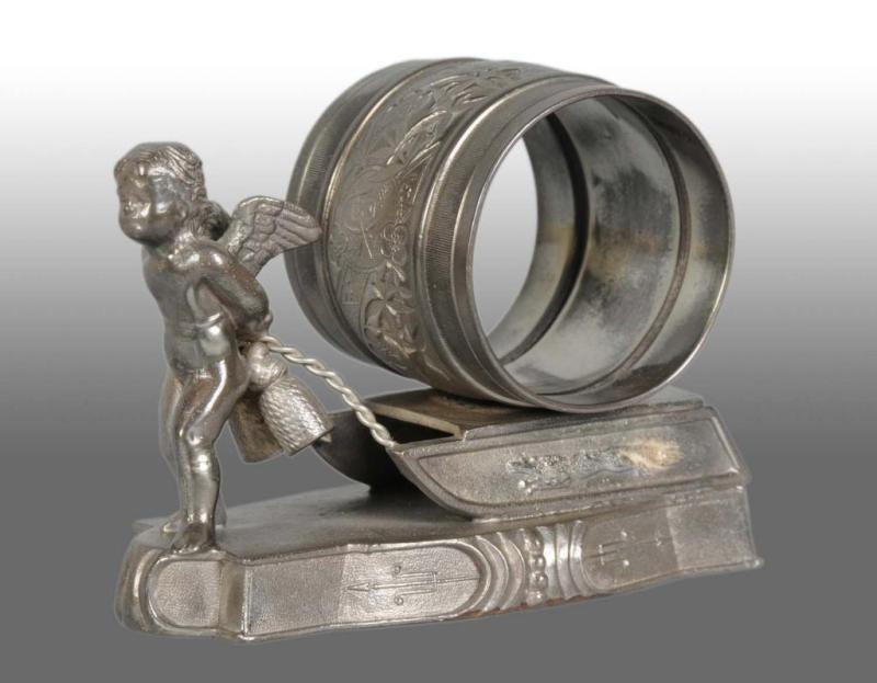 Appraisal: Winged Cherub Pulling Figural Napkin Ring Description Marked Meriden Silverplate