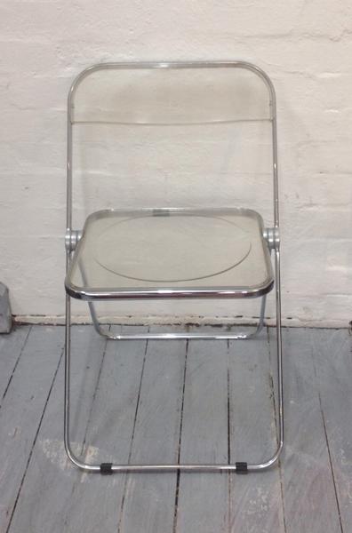 Appraisal: PAIR OF ITALIAN CASTELLI LUCITE AND CHROME FOLDING CHAIRS