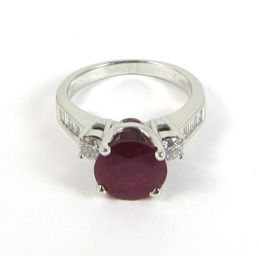 Appraisal: RUBY DIAMOND AND FOURTEEN KARAT WHITE GOLD RING accented with