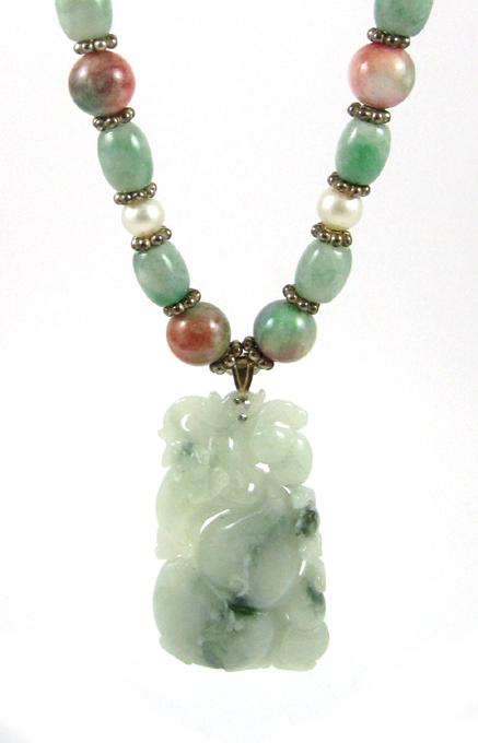 Appraisal: JADE AND SILVER BEAD NECKLACE measuring inches in length strung