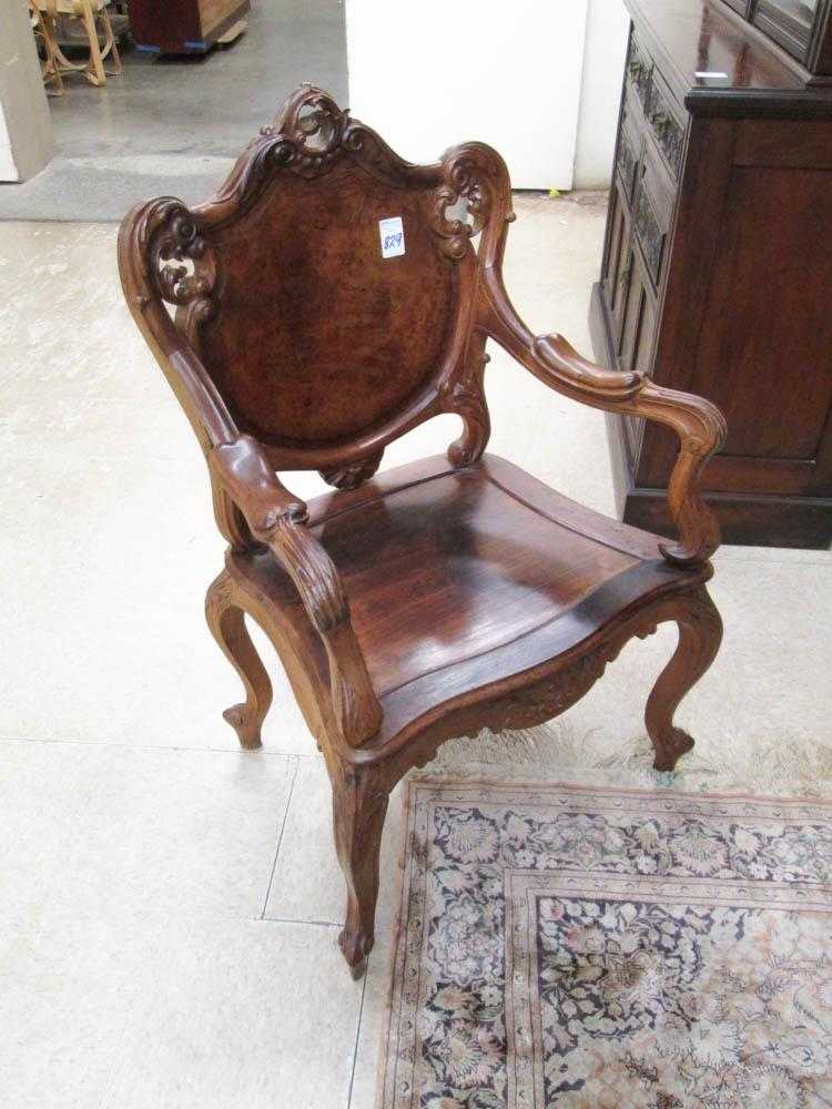 Appraisal: LOUIS XV STYLE ARMCHAIR Continental early th century of carved