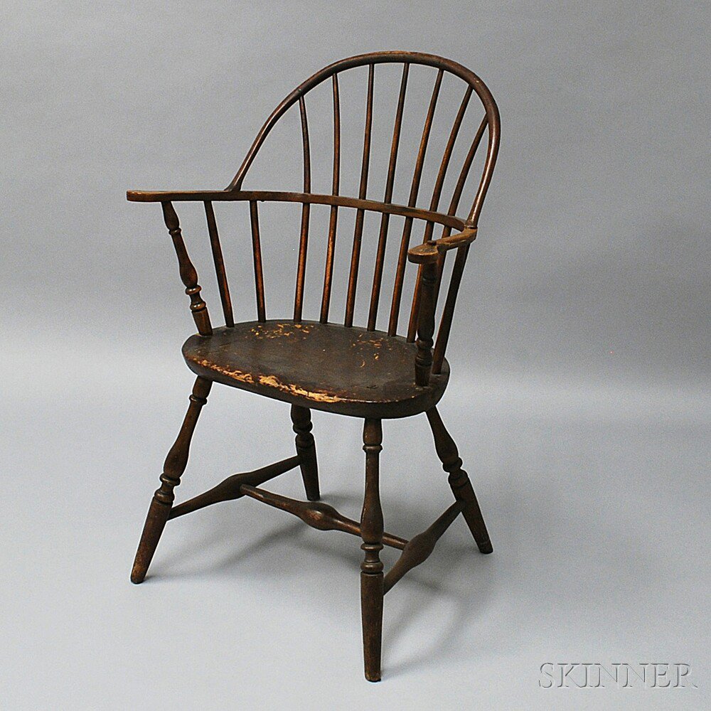 Appraisal: Brown-painted Sack-back Windsor Chair America late th century with shaped