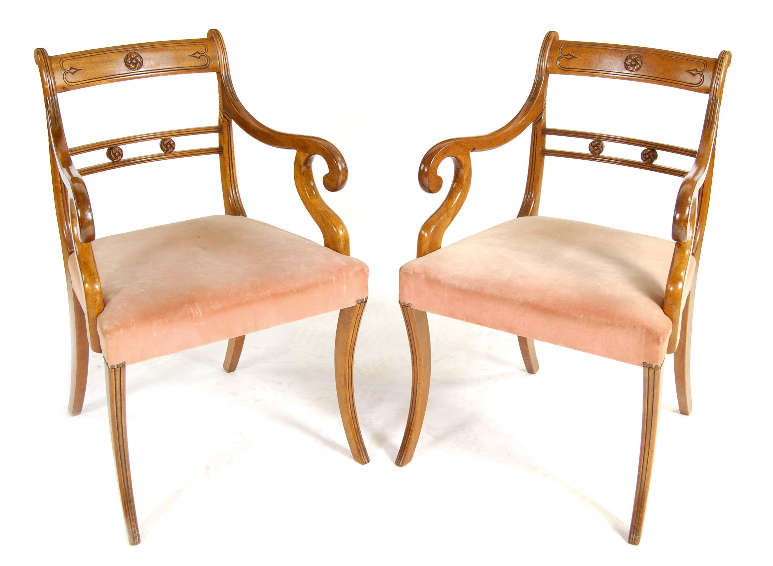 Appraisal: A pair of mahogany open armchairs in Regency style