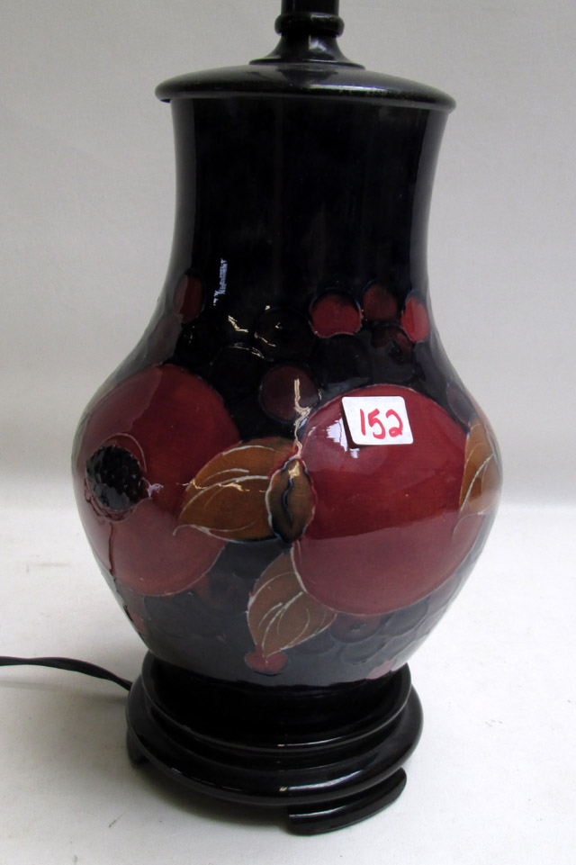 Appraisal: MOORCROFT POTTERY LAMP hand painted under glaze in a fruit