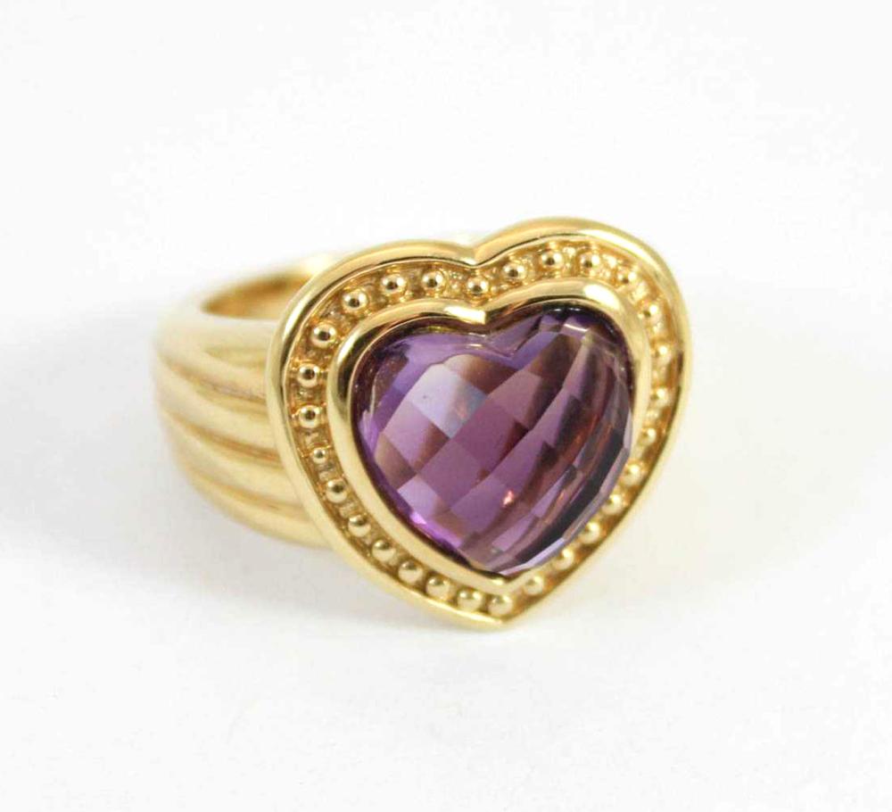 Appraisal: AMETHYST AND EIGHTEEN KARAT GOLD RING The hollow k yellow