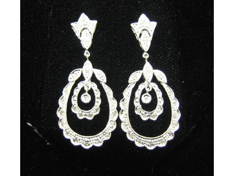 Appraisal: DIAMOND DANGLE EARRINGS k white gold with diamonds Estimate -