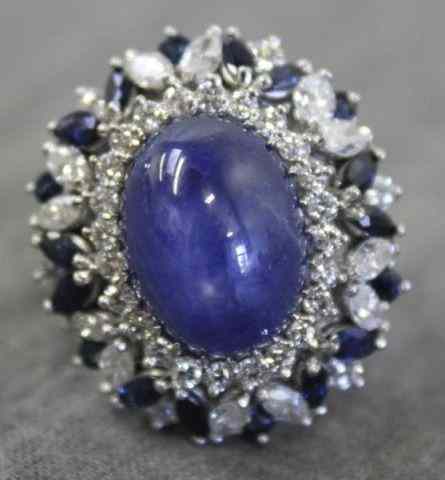 Appraisal: Kt White Gold Star Sapphire Sapphire andDiamond Ring Central oval-shaped