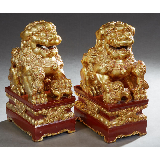 Appraisal: Pair of Chinese Gilt and Carved Red Lacquered Wood Foo