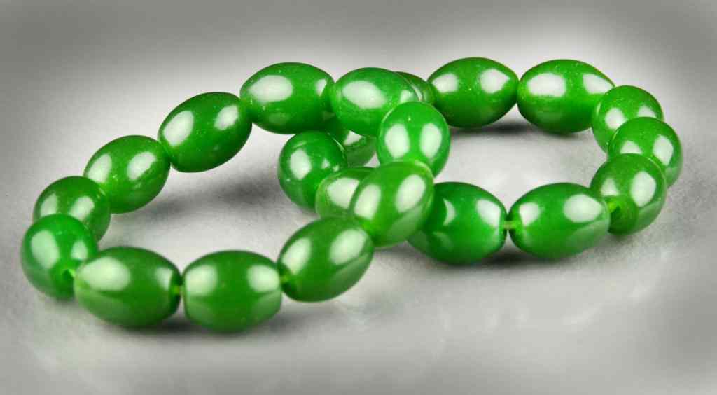 Appraisal: Pr Chinese Jade Bead BraceletsEach conssting of eleven oval shaped