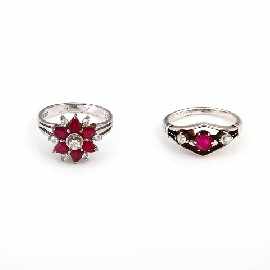 Appraisal: Two sterling silver red and colourless stone dress rings sizes