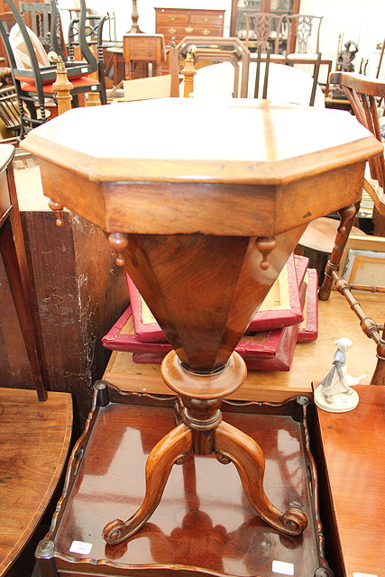 Appraisal: A VICTORIAN OCTAGONAL ROSEWOOD WORK TABLE the lifting lid enclosing