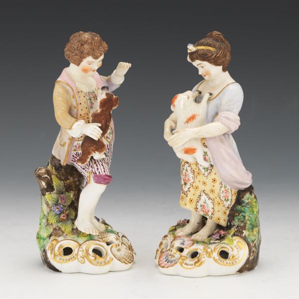 Appraisal: TWO DRESDEN FIGURINES OF YOUTHS Two figurines of a young