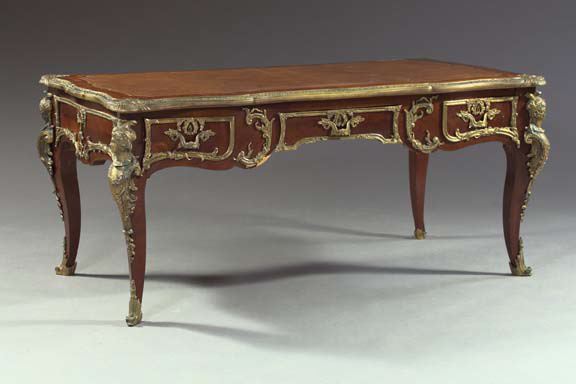 Appraisal: Louis XV-Style Gilt-Brass-Mounted Mahogany Bureau Plat with a shaped banded