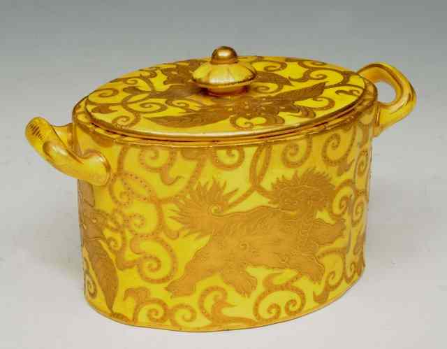 Appraisal: A ROYAL CROWN DERBY YELLOW GROUND SUGAR BOX AND COVER