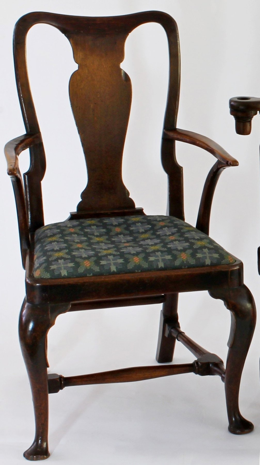 Appraisal: A George I walnut armchair with vase shaped splat back