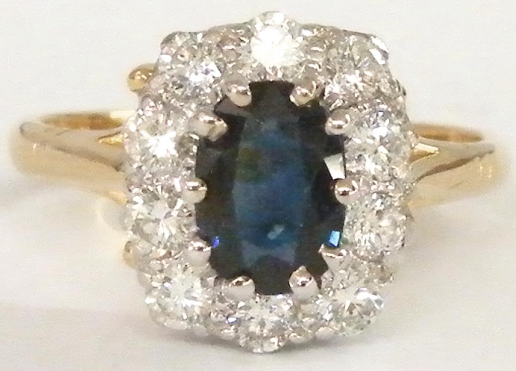 Appraisal: ct period sapphire and diamond cluster ring size N