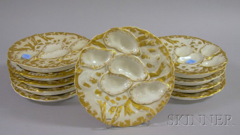 Appraisal: Set of Ten Gilt Porcelain Oyster Plates probably Limoges for