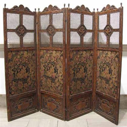 Appraisal: Louis XIV style carved and caned four panel screenWith needlepoint