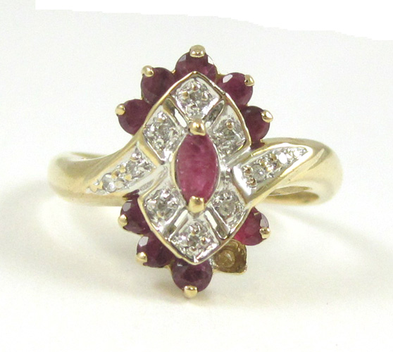 Appraisal: RUBY DIAMOND AND TEN KARAT GOLD RING The yellow and