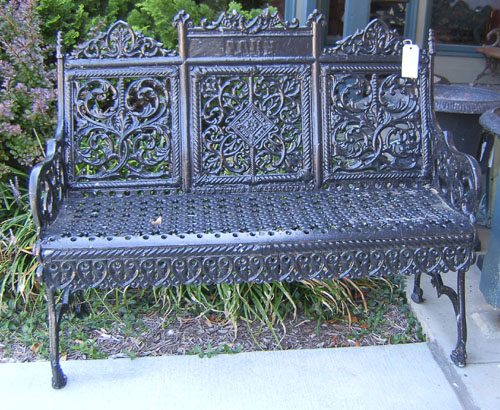 Appraisal: Three cast iron patio benches mid late th c