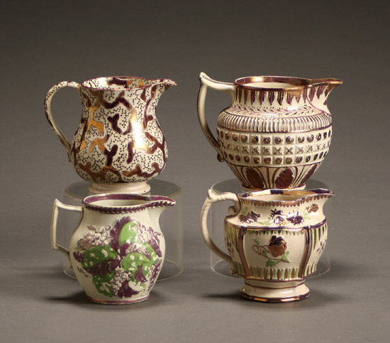 Appraisal: Group of Four English Pink Lustre Decorated Jugs Early to