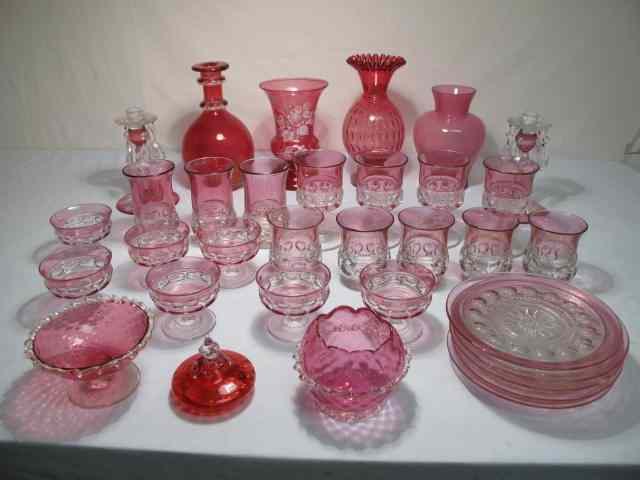 Appraisal: Large lot cranberry flash glass items Includes matching set of