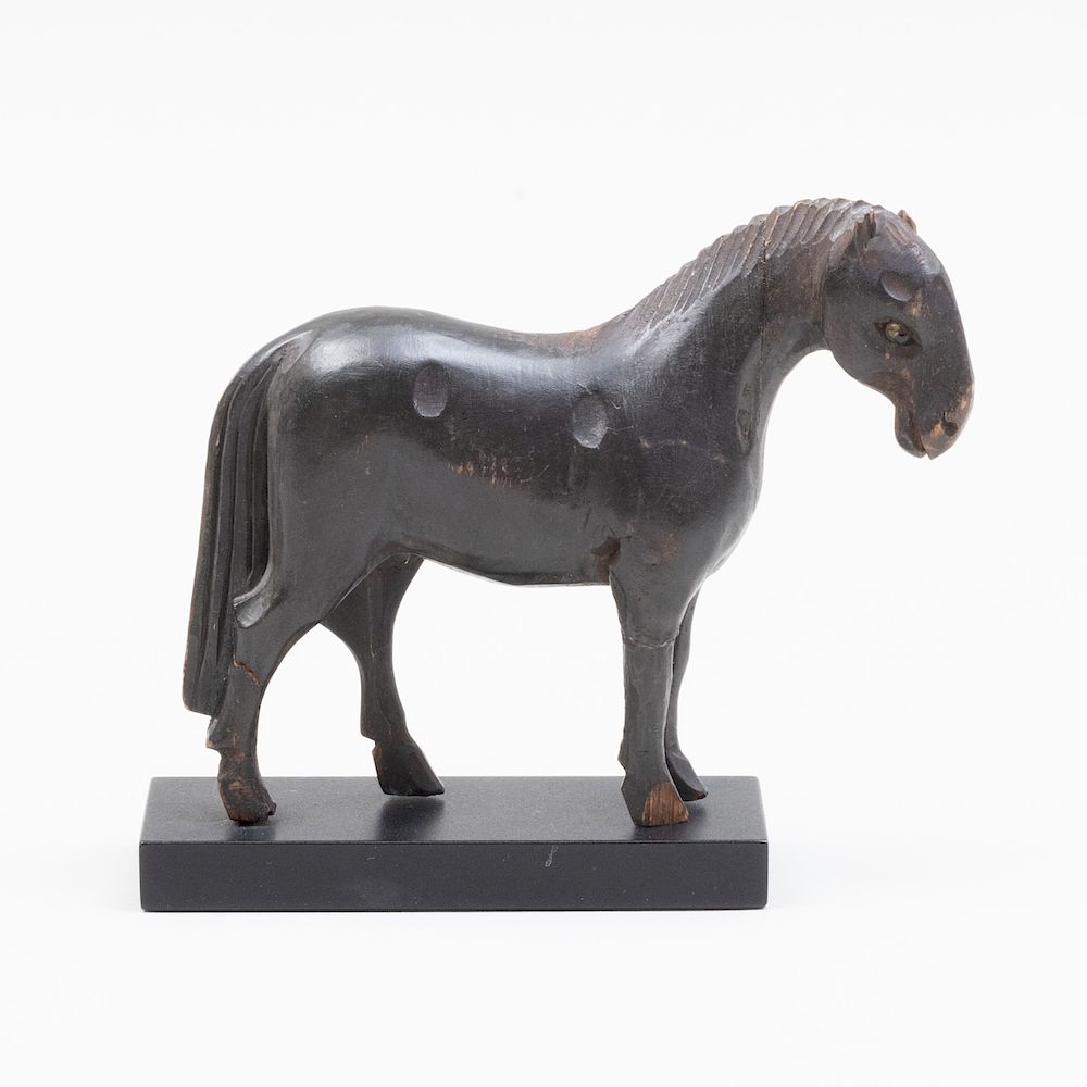 Appraisal: Small Black Painted Carved Wood Horse Fitted with glass eyes