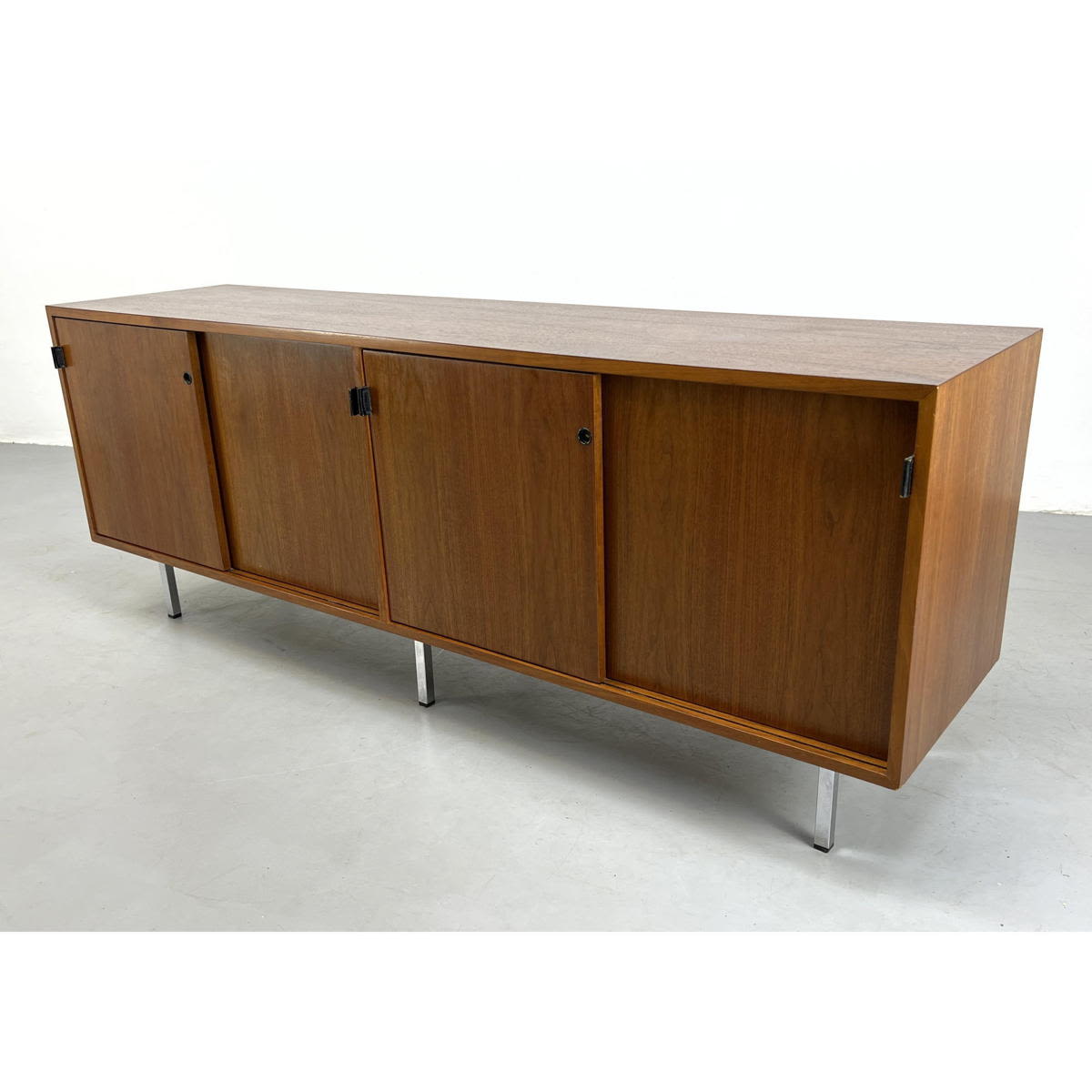 Appraisal: FLORENCE KNOLL for Knoll Associates cabinet in Walnut with sliding