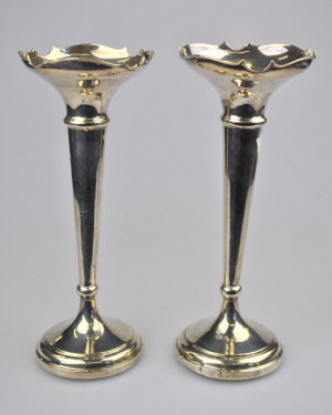 Appraisal: A pair of silver vase flutes on weighted bases Birmingham