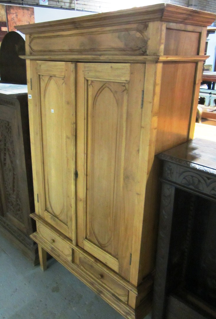 Appraisal: A th century hardwood two door cupboard