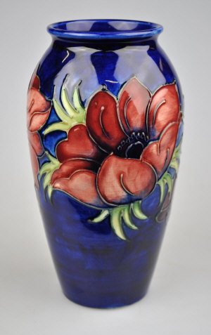 Appraisal: A Moorcroft baluster vase blue ground decorated with the Anemone