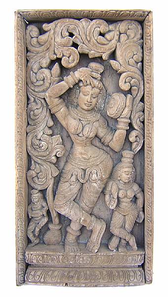 Appraisal: An Indian carved wood temple plaque height in