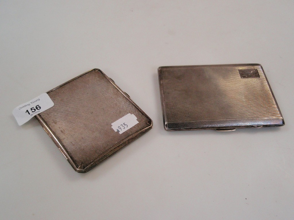 Appraisal: Two machine turned silver cigarette cases