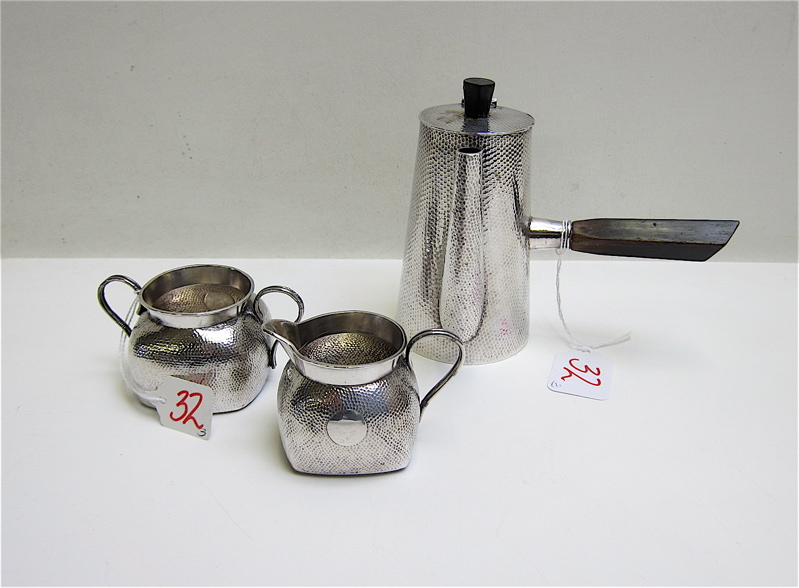 Appraisal: THREE JAPANESE EXPORT SILVER HOLLOWWARE PIECES a hammered coffee pot