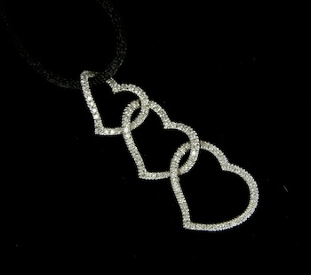 Appraisal: A Diamond Triple Heart Pendant in k White Gold k