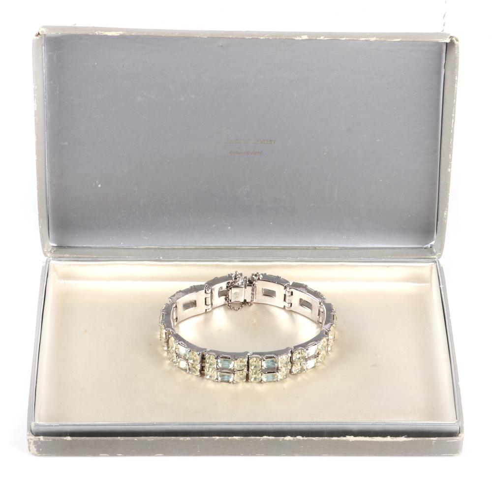 Appraisal: EISENBERG ORIGINAL DECO RHODIUM PLATED BRACELET WITH PALE YELLOW EMERALD-CUT