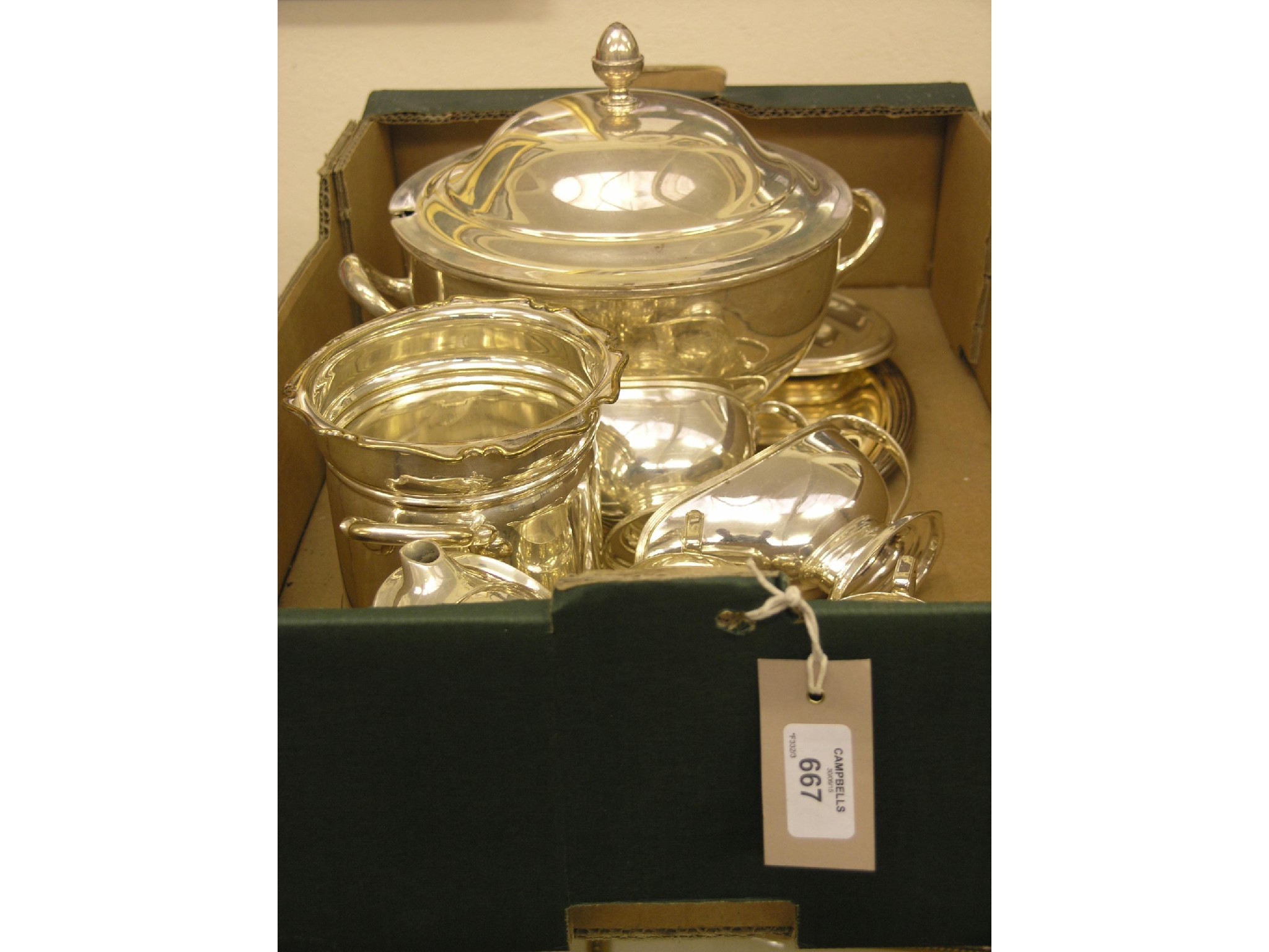 Appraisal: A silver plated vegetable tureen with cover and other silver