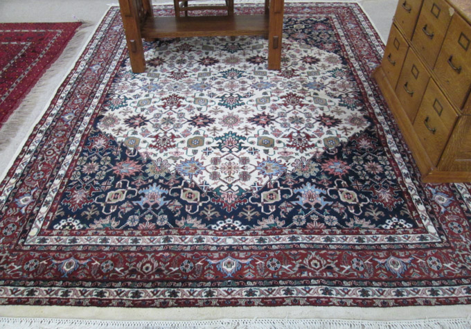 Appraisal: HAND KNOTTED ORIENTAL CARPET Indo-Persian stylized leaf pattern on hexagonal